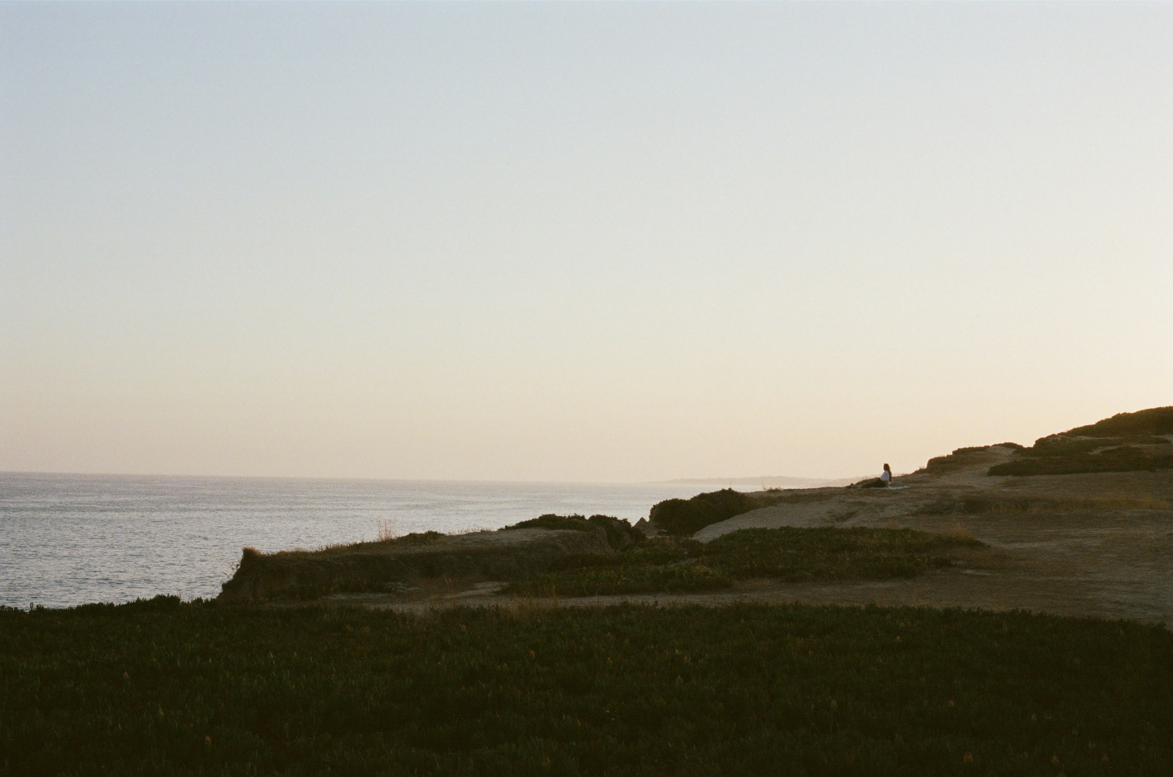 A quiet stretch of Portugal’s Algarve coast photographed on film at sunset